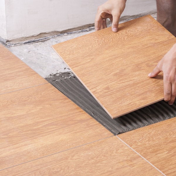 laying tiles on the floor