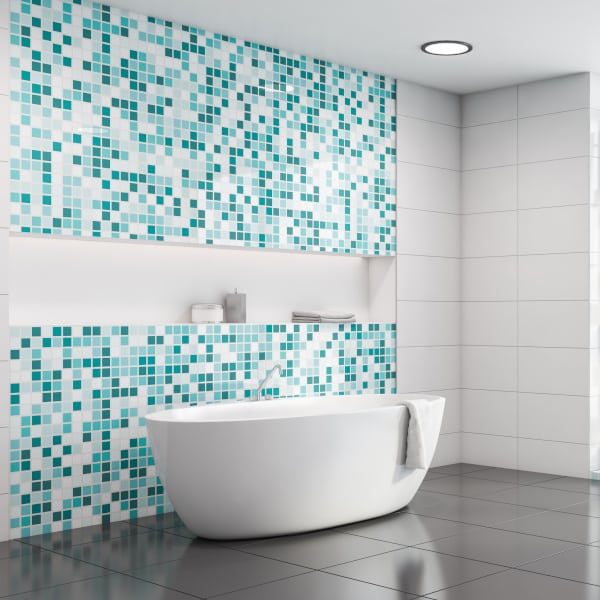 White and blue mosaic bathroom corner with tub
